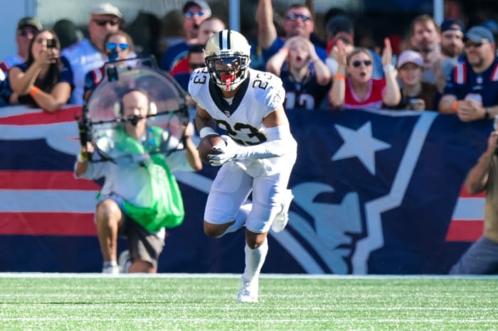 New Orleans Saints cornerback Marshon Lattimore (23) intercepts a pass against New England. Mandatory Credit: Stephen Lew-USA TODAY